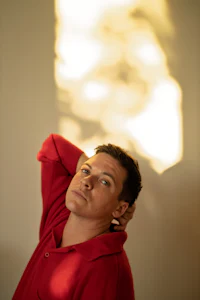 a man wearing a red shirt
