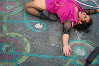 a woman laying on the ground